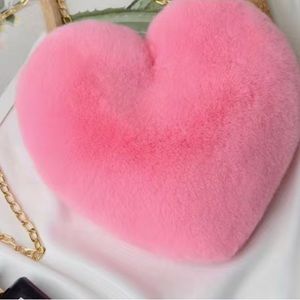 NIB Barbie Pink faux fur heart shaped purse with gold chain strap.